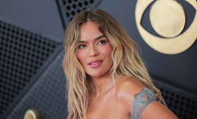 Karol G Turns Heartbreak Into Her Most Vulnerable Album Yet, Capping a Landmark Year for Latina Representation