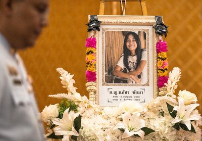 At a temple in Thailand, parents mourn a 12-year-old mass shooting victim, and a father pleads for forgiveness