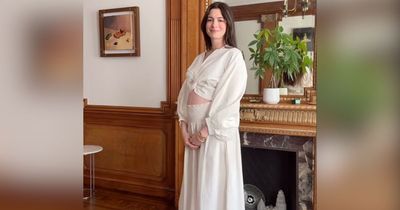 Anne Hathaway's Baby Bump Raises 'Fake Pregnancy' Theories After She Exposes Belly During Movie Premiere