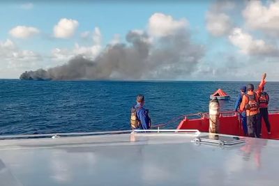 One dead and scored rescued from burning passenger ferry near Bali