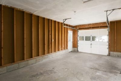 Why Do So Many New Homes Come With Unfinished Garage Walls?