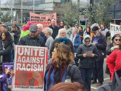 Victorian police investigate allegation a car drove deliberately at speed towards anti-racism protester