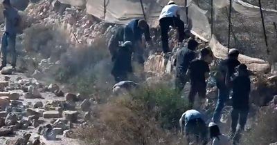 Israeli settlers trap Palestinian families in their homes in occupied West Bank