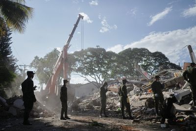 Rescuers in Colombia call for silence around earthquake rubble as the window for survival narrows