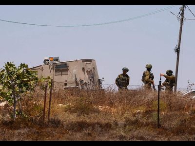 Israel sends troops into West Bank homes besieged by Jewish settlers