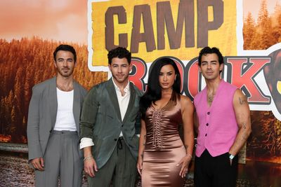 Demi Lovato Reunites With the Jonas Brothers in Vintage Dolce & Gabbana at the 'Camp Rock 3' Premiere
