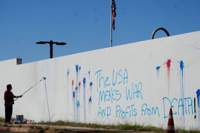 Wall of US Embassy in Brazil's capital is vandalized as relations remain tense