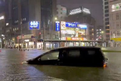 Japan's 'Unprecedented' Rain Strands 7,000 at Tokyo Airport, Turning It Into a Makeshift Shelter