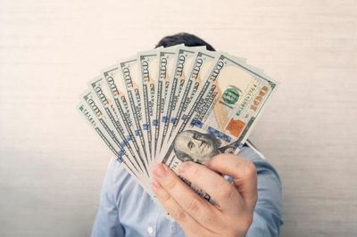 7 Things to Do With an Unexpected $1,000, Ranked From Smartest to Riskiest