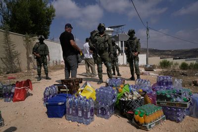Palestinians besieged in West Bank village fear Israeli settlers will seize their homes