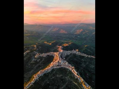 In 2021, Sicilian photographer Giuseppe Peri stitched drone photos of Centuripe into one image. Two years later, it produced a viral sensation, turning the ancient town into a global attraction for its remarkable human-shaped outline