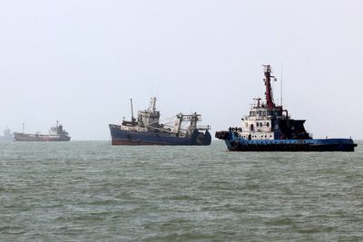 Trump threatens to claim Strait of Hormuz as US territory as Iran hits back