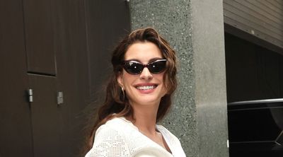Anne Hathaway's pretty white cardigan and wide-leg trousers are a masterclass in how to style trending crochet