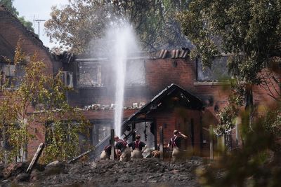 Military deployed as 37 wildfires burn across the country