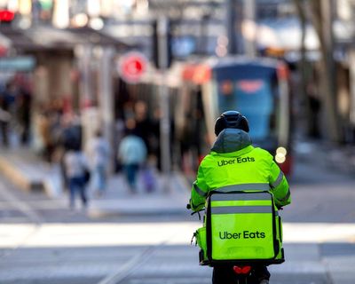 Delivery drivers will get minimum wage in Australia’s ‘world-first’ deal. Is it fair – and will Uber Eats cost more?
