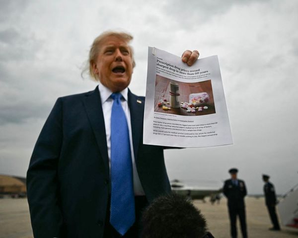Trump shows off article on lower drug prices that says Biden deserves credit, not him