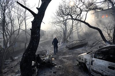 Belgian wildfire approaches Germany despite rain as Greece probes deadly blaze
