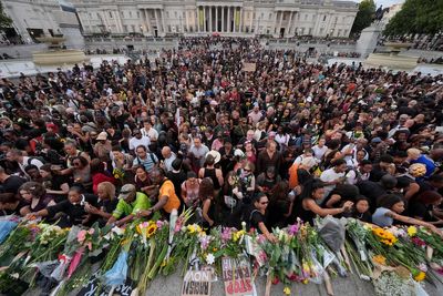 Mourners gather in Trafalgar Square for a vigil honouring former Cambridge professor Jason Arday