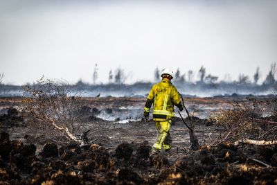 Fears undiscovered WWII munitions could explode as wildfires burn underground