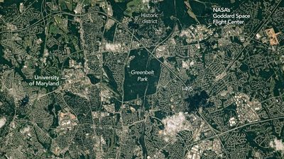 Washington's suburbs spread across Maryland, but a NASA image shows green corridors still woven through the urban landscape