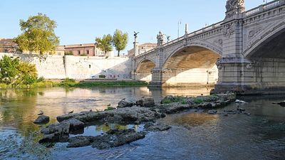 Drought exposes remains of ancient Roman bridge in the Tiber river in Rome