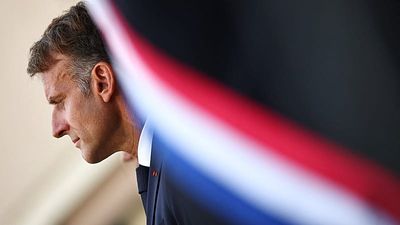 French President Emmanuel Macron signs assisted dying legislation into law