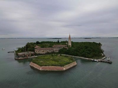 Deadly plague ravaged this Italian island, thousands died and were burned, with ashes rumoured to make up 50% of the ground before it became home to a haunted mental hospital