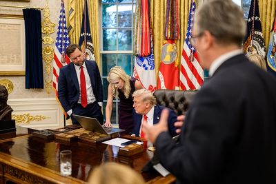 Trump Reportedly 'Brushed Off' His Son's Fears About the Aide Living in His Golf Club's Women's Locker Room
