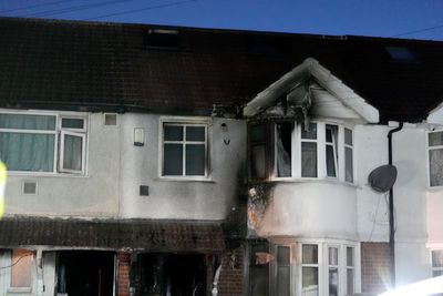 Murder probe continues after London house fire kills woman and injures eight
