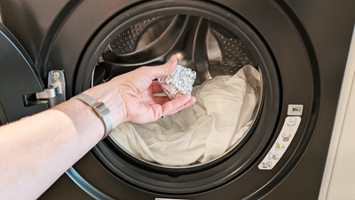 People are putting aluminum foil in their washing machines — I asked an appliance expert if it’s safe
