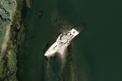Sunken WWII tugboat emerges as extreme heat empties Europe’s rivers