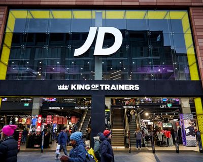 JD Sports cuts £50m from profit forecast as cost of living pressures hit trainer sales