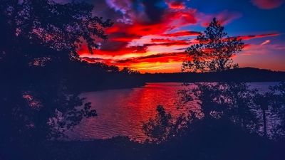 Georgia man boating on allegedly haunted lake stops to catch his hat when it blows off. Then he falls.