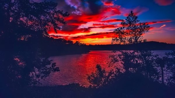 Georgia man boating on allegedly haunted lake stops to catch his hat when it blows off. Then he falls.