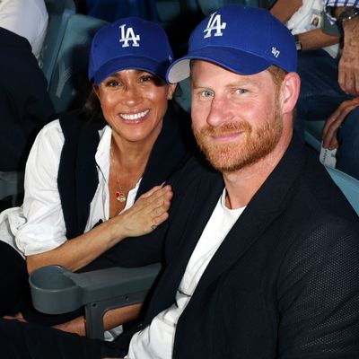 Meghan Markle “Is Taking One for the Team” For Prince Harry By Moving to Britain, Says Royal Expert