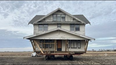 An Iowa family moved the entire $12,000 farmhouse four miles on wheels to create their dream home
