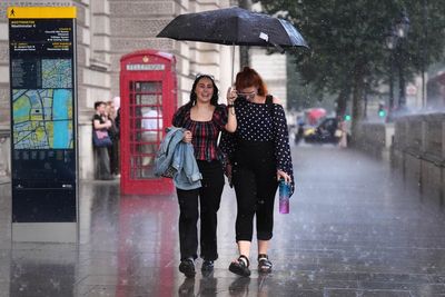 Flash flood warnings for UK as heavy rain batters drought-hit ground