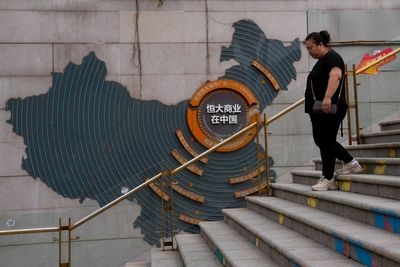 China moves to wrap up saga of troubled property giant Evergrande after founder gets life sentence