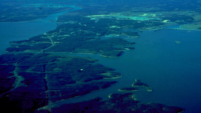 In 1944, TVA impounded Kentucky Lake to control floods and make power; decades later Land Between the Lakes drew roughly 2 million visitors a year