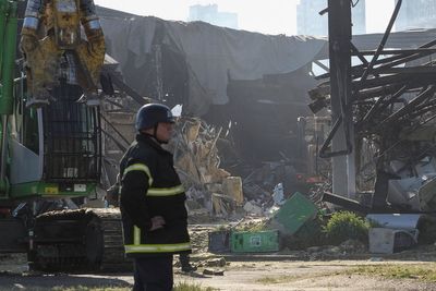 Zelensky vows revenge after Russian double-tap strike on shopping mall in his hometown kills 16