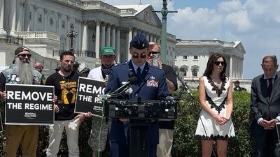 US airman who was arrested for Trump impeachment protest is ‘ordered into pretrial confinement’ again after reportedly refusing to wear uniform
