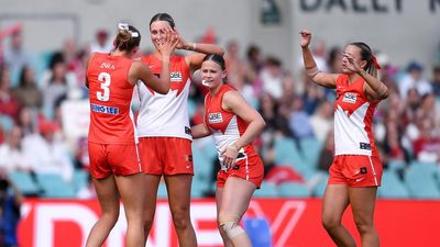 Swans' AFLW team ride record support for Bombers win