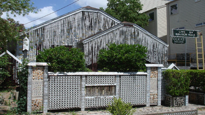 In 1995, a retired British bus driver began covering his modest home with empty beer containers; around 75,000 cans later, it was known as the Can House