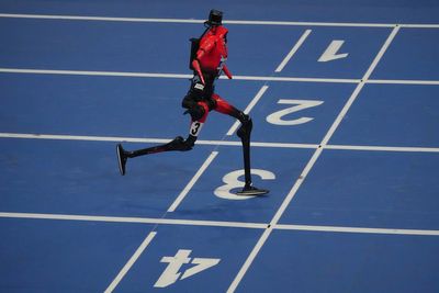 Humanoid robots sprint, play soccer and set records at Beijing games, in photos