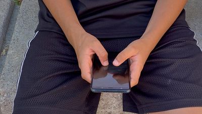 Macron confirms school mobile phone ban effective from new term