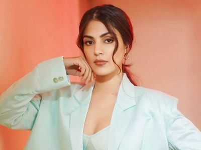 Rhea Chakraborty moves into new Mumbai home featuring a private elevator, huge glam room and walk-in closet, floor-to-ceiling windows overlooking Linking Road, earthy-toned interiors, statement décor and a chic wood-and-wicker dining space