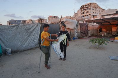 Israeli defence minister threatens crackdown on kites flown from Gaza saying they will be ‘treated the same as a drone’
