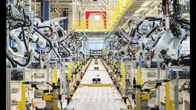 China's Geely used 800 engineers and AI to create a modular EV manufacturing system; Ford is now applying it in Spain, aiming to slash development time and costs by half without building the system itself