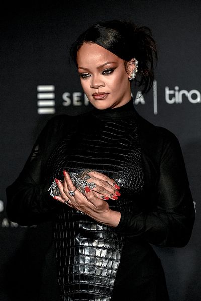 Rihanna Debuts Asymmetric Denim Skirt-Jeans Hybrid at Paris Dinner