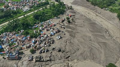 At least 160 dead and hundreds missing after floods strike Nepal-China border